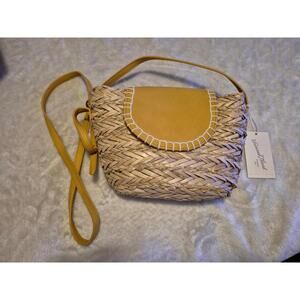Mustard yellow woven purse universal thread